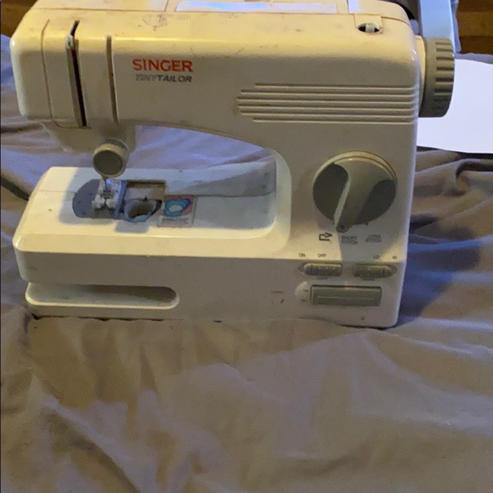Singer tiny tailer sewing machine.